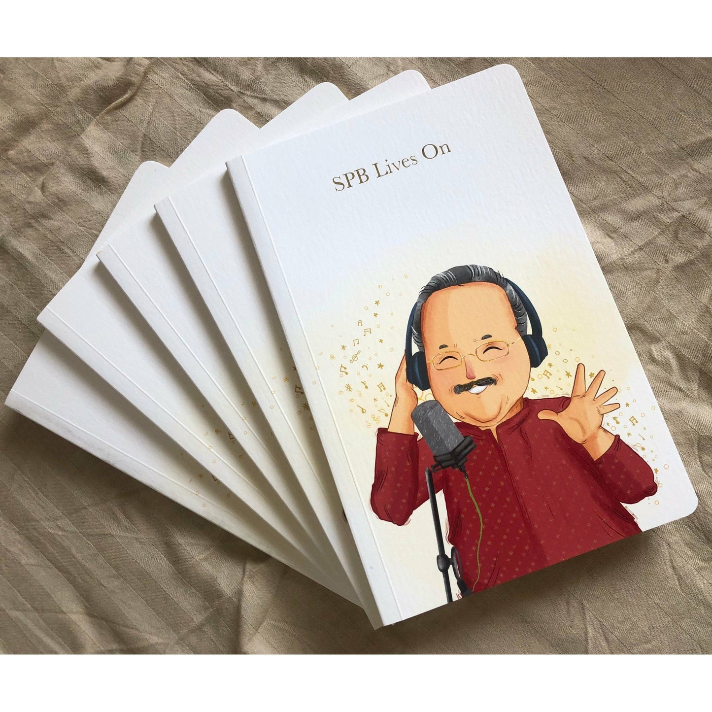 SPB Lives On notebook with illustrated cover